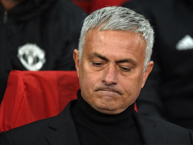 Manchester United's Portuguese manager Jose Mourinho awaits kick off in the Champions League group H football match between Manchester United and Juventus at Old Trafford in Manchester, north west England, on October 23, 2018. (Photo by Oli SCARFF / AFP)