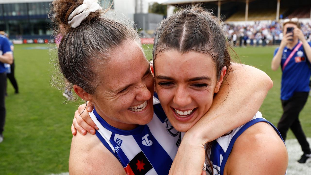 Emma Kearney (left) and Erika O'Shea soak up the victory. Picture: Michael Willson/AFL Photos via Getty Images