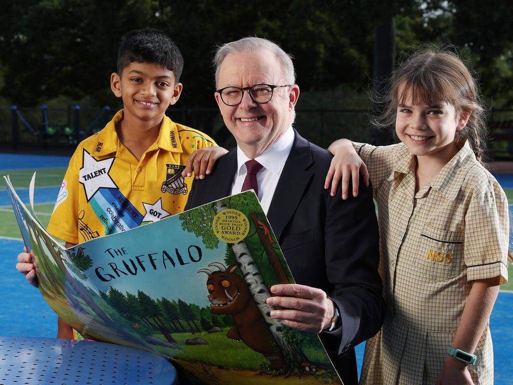 Every one of the Bee’s previous national champions have been avid readers and Prime Minister Anthony Albanese took time out to read a children’s classic with Nundah State School students Avhi Hejeebu, 11, year 6; and Matilda Sedgman, 8, year 3, while visiting the school to launch the 2024 national school spelling challenge, run by classroom news site Kids News. Picture: Liam Kidston