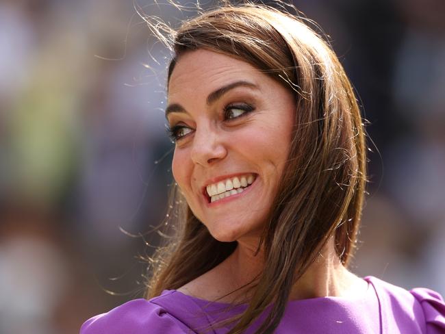 LONDON, ENGLAND - JULY 14: Catherine, Princess of Wales, Patron of The AELTC smiles prior to presenting Carlos Alcaraz of Spain with his trophy following victory against Novak Djokovic of Serbia in the Gentlemen's Singles Final during day fourteen of The Championships Wimbledon 2024 at All England Lawn Tennis and Croquet Club on July 14, 2024 in London, England. (Photo by Clive Brunskill/Getty Images)