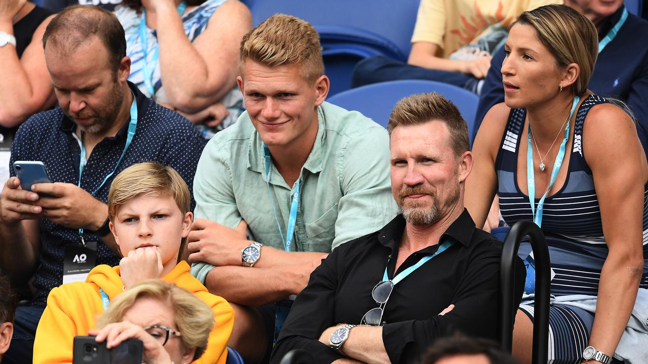 Adam Treloar, his wife Kim and Nathan Buckley watched Nick Kyrgios play Rafael Nadal at the Australian Open in January. (Photo by Quinn Rooney/Getty Images)