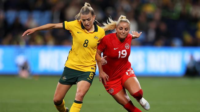 SYDNEY, AUSTRALIA – SEPTEMBER 06: Charlotte Grant of the Matildas and Adriana Leon of Canada compete for the ball during the International Friendly Match between the Australia Matildas and Canada at Allianz Stadium on September 06, 2022 in Sydney, Australia. (Photo by Mark Kolbe/Getty Images)