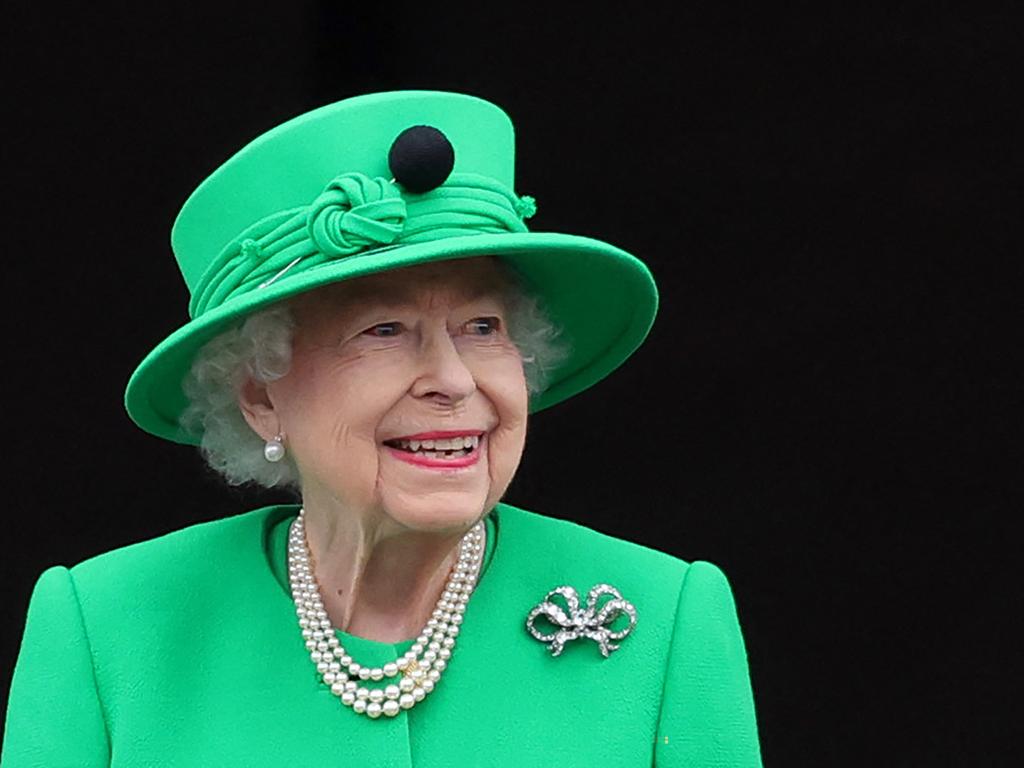 Britain's Queen Elizabeth II smiles to the crowd from Buckingham Palace balcony at the end of the Platinum Pageant. Picture: AFP.