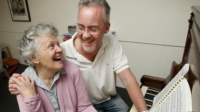 Pauline Stevens, 78, regained the ability to play the piano after taking the new drug. She is pictured with Associate Professor Steve Macfarlane. Picture: David Caird