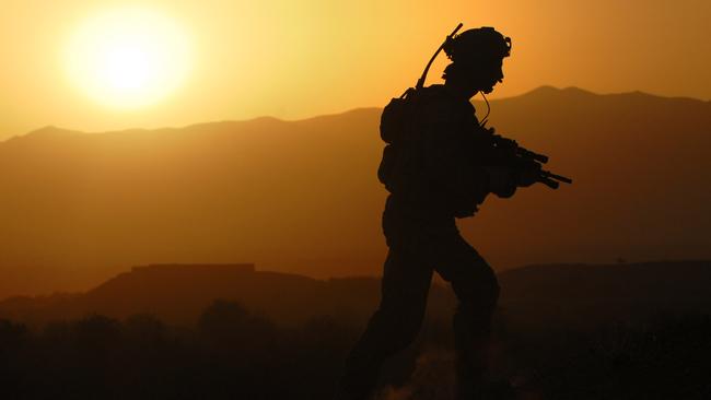 An Australian soldier on patrol in Tarin Kowt, Oruzgan Province. Afghanistan