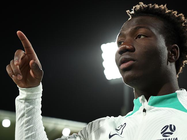 PERTH, AUSTRALIA - JUNE 10: Nestory Irankunda of Australia looks on before taking to the field during an Australia Socceroos press conference and training session at HBF Park on June 10, 2024 in Perth, Australia. (Photo by Paul Kane/Getty Images)