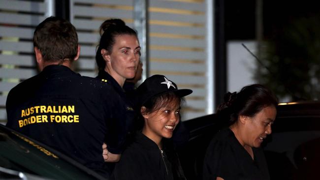 Two suspected illegal immigrants are taken to the Mossman Police Station overnight. Picture: Marc McCormack