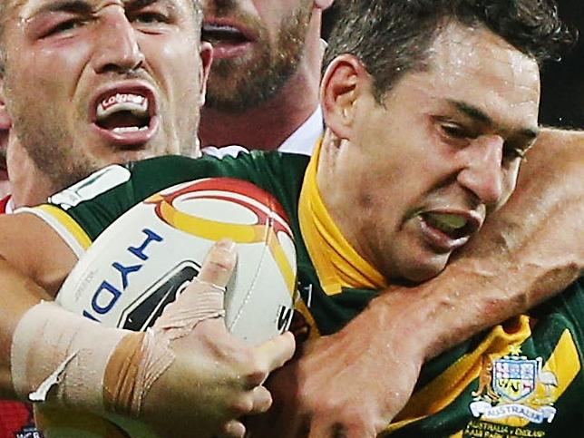 MELBOURNE, AUSTRALIA - OCTOBER 27:  Billy Slater of the Kangaroos still scores a try after a heavy tackle from Sam Burgess of England during the 2017 Rugby League World Cup match between the Australian Kangaroos and England at AAMI Park on October 27, 2017 in Melbourne, Australia.  (Photo by Michael Dodge/Getty Images)