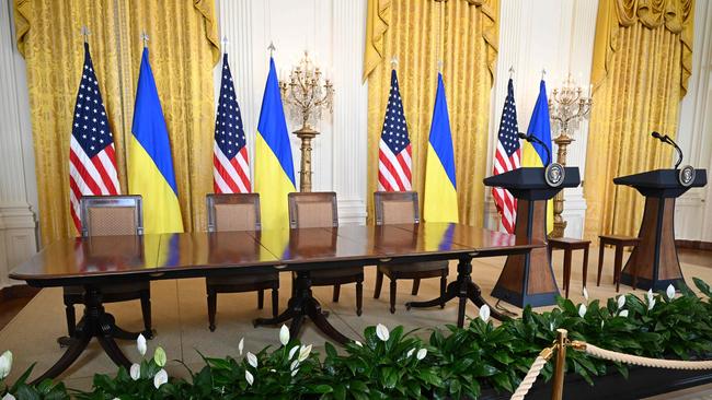 The stage had been set for Donald Trump and Volodymyr Zelensky to hold a scheduled press conference in the East Room of the White House. It was not to be. Picture: AFP