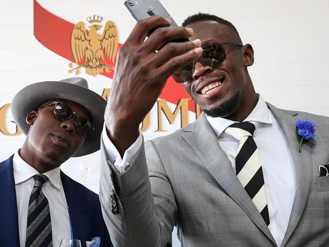Usain Bolt taking a selfie at Derby Day. Picture: Ian Currie