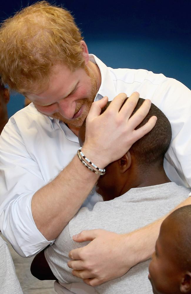 Mutsu and Harry are reunited in 2016 when Mutsu was singing as part of the Basotho Youth Choir in London. Picture: Getty