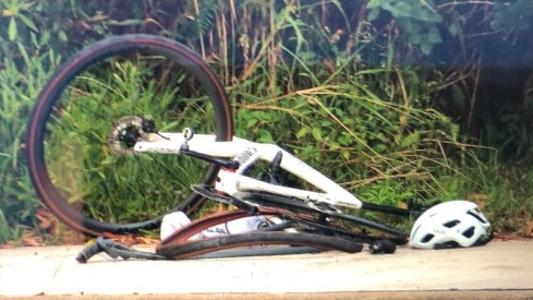 A damaged bike at the scene of the crash. Picture: Jim O'Rourke