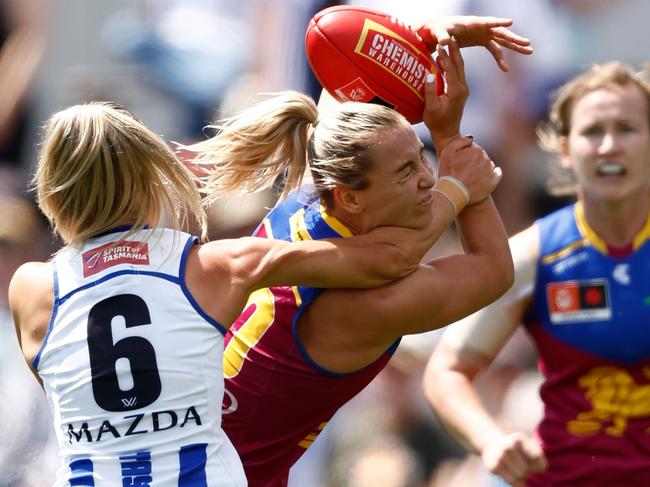 MELBOURNE, AUSTRALIA - DECEMBER 03: Natalie Grider of the Lions is tackled by Alice O'Loughlin of the Kangaroos during the 2023 AFLW Grand Final match between The North Melbourne Tasmanian Kangaroos and The Brisbane Lions at IKON Park on December 03, 2023 in Melbourne, Australia. (Photo by Michael Willson/AFL Photos via Getty Images)