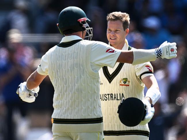 Steve Smith celebrates with Travis Head on day one. Picture: Justin Setterfield/Getty