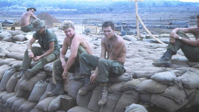 AT WAR: Tunnel Rats in Vietnam, from left, Corporal Merv Dodd, Sapper Chuck Bonzas, Sapper John Hoskin, Sapper Lyndon Stutley and Sapper Barry McKay. Picture: PETER MacDONALD