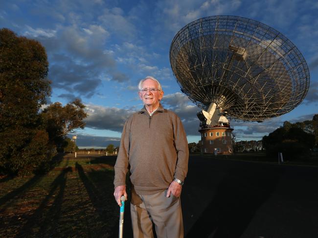 David Cooke, now 87, at the CSIRO radio telescope outside Parkes, western NSW. He was the receiver engineer at Parkes during the Apollo 11 mission. Picture: ​Britta Campion