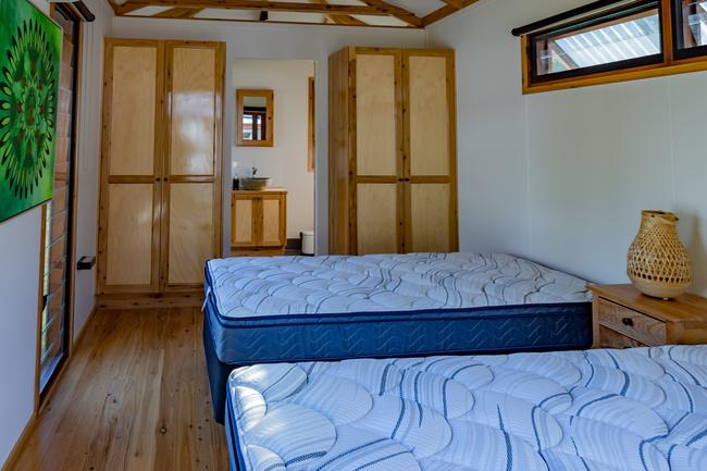 The Mount Jukes Eco Resort, built from scratch by yoga aficionado David Deakin, holds glamping tents and a half-moon shaped house that face Mt Jukes and Mr Deakin says the â€œenergyâ€ of the property has to be experienced to be understood. Picture: Contributed