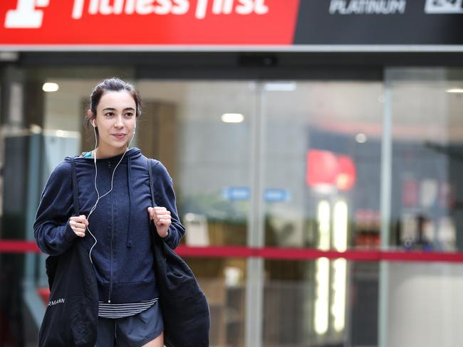 Keelye Hamner cleared out her locker from Fitness First George Street after hearing news of a confirmed coronavirus case. Picture: Gaye Gerard