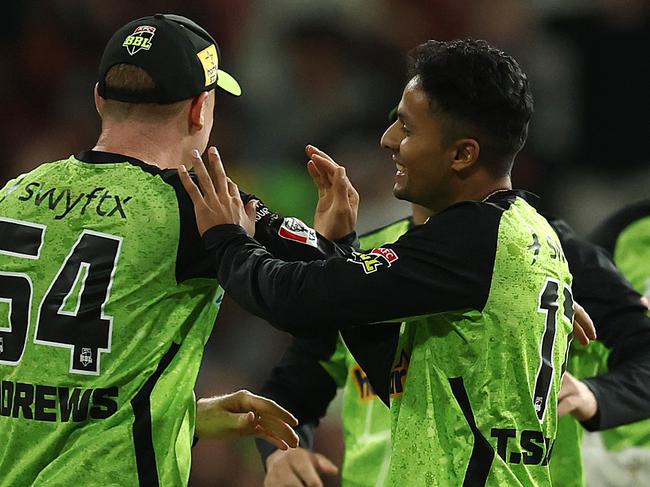 SYDNEY, AUSTRALIA - JANUARY 22: Tanveer Sangha of the Thunder celebrates after taking the wicket of Tom Curran of the Stars during the BBL The Knockout match between Sydney Thunder and Melbourne Stars at ENGIE Stadium on January 22, 2025 in Sydney, Australia. (Photo by Robert Cianflone/Getty Images)