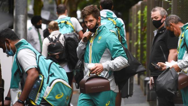 Australian captain Tim Paine, centre, leaves the team's hotel in Melbourne on Tuesday. Picture: William West/AFP