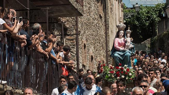 Thousands of devotees join in the procession of Maria di Polsi in the heart of the Aspromonte mountains, near San Luca in Calabria. Picture: Supplied