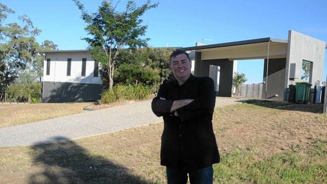 Clint Christison with one of the Grantham properties being sold by Lockyer Valley Regional Council. Picture: Gary Worrall