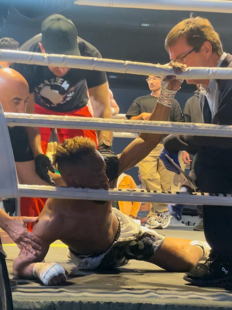 Kazeem Soyoye collapses after his loss. Picture: Supplied