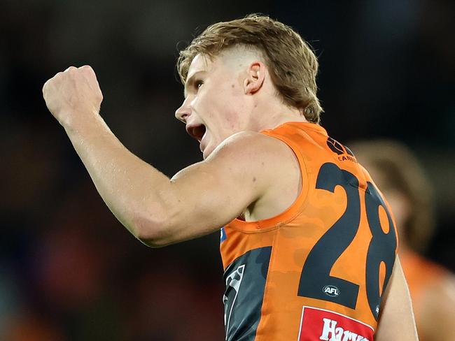 CANBERRA, AUSTRALIA - APRIL 25: Harvey Thomas of the Giants celebrates kicking a goal  during the round seven AFL match between Greater Western Sydney Giants and Brisbane Lions at Manuka Oval, on April 25, 2024, in Canberra, Australia. (Photo by Mark Metcalfe/AFL Photos/via Getty Images )