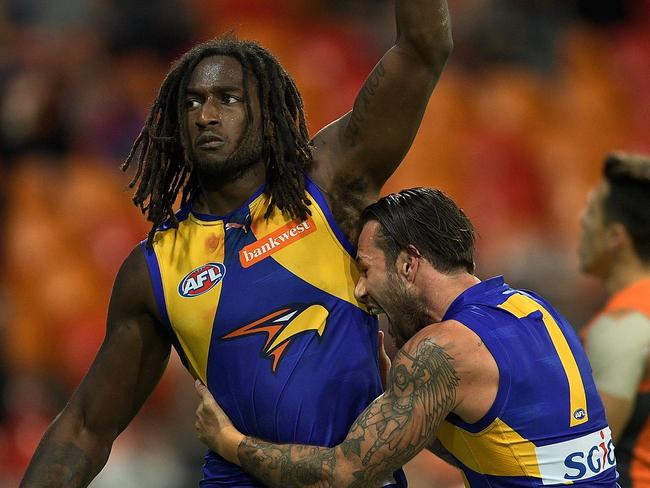 SYDNEY, AUSTRALIA - AUGUST 13: Nic Naitanui of the Eagles celebrates kicking the winning goal during the round 21 AFL match between the Greater Western Sydney Giants and the West Coast Eagles at Spotless Stadium on August 13, 2016 in Sydney, Australia. (Photo by Brett Hemmings/AFL Media/Getty Images)