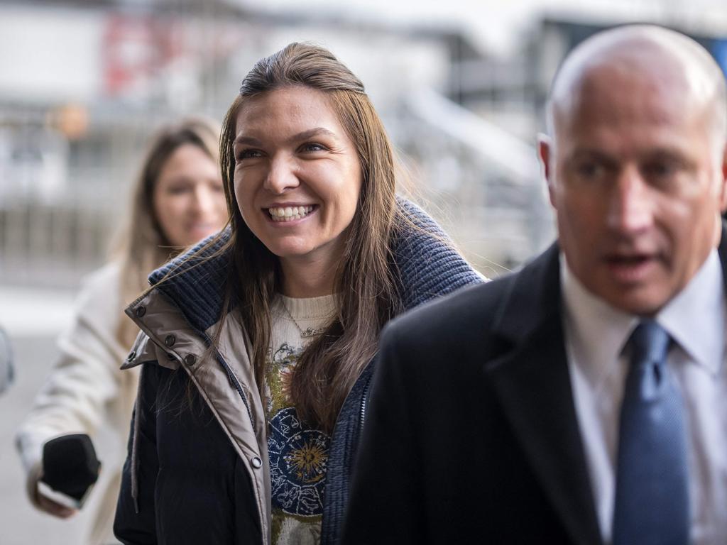 Former world number one tennis player Romania's Simona Halep and her lawyer Howard Jacobs arrive at the Court of Arbitration for Sport. Picture: Fabrice COFFRINI / AFP