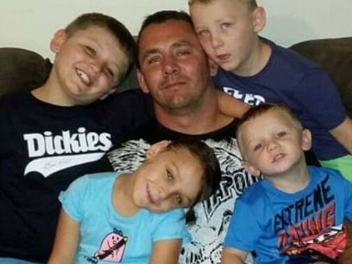 Mark Keans, centre, wants to see his children. Picture: Supplied