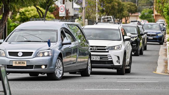 At least seven cars with grieving family and friends followed the hearse. Picture: NewsWire