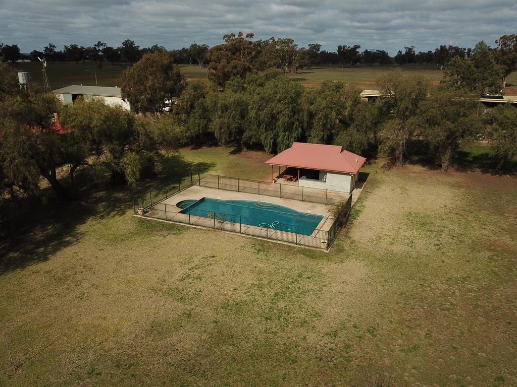 The homestead also features a parlour, billiards room, butler’s room, wood burning heater and an in-ground, heated swimming pool.