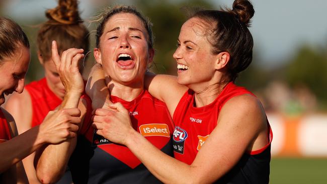 Melissa Hickey and Daisy Pearce celebrate a Melbourne win. Picture: Getty Images