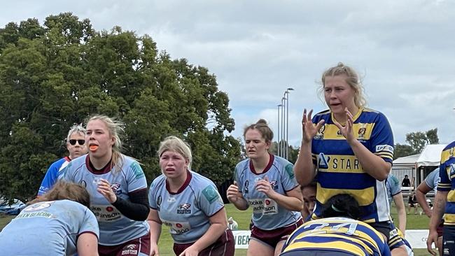 Line out action between Easts and Norths' women.