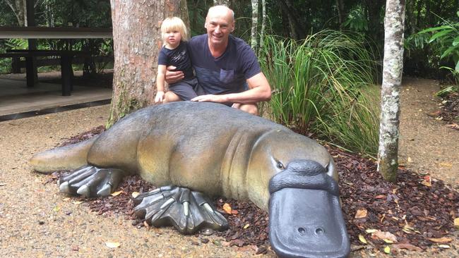 Platypus Lodge Restaurant and Cafe owner Oskar Krobath with his grandchild Elaina at Broken River. Picture: Contributed