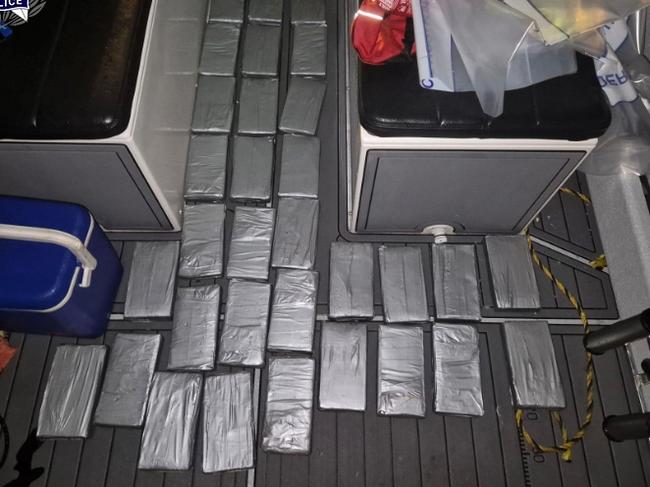 Three Lake Macquarie men have been dramatically arrested as they powered back into a Boyne Island boat ramp, about 24km north of Gladstone on April 28, 2024. Federal Police allege there was 500kg of cocaine on board their eight-metre tinny. Picture: Australian Federal Police