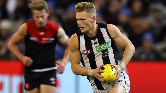 Adam Treloar in action against Melbourne on the Queen’s Birthday. Picture: Michael Klein