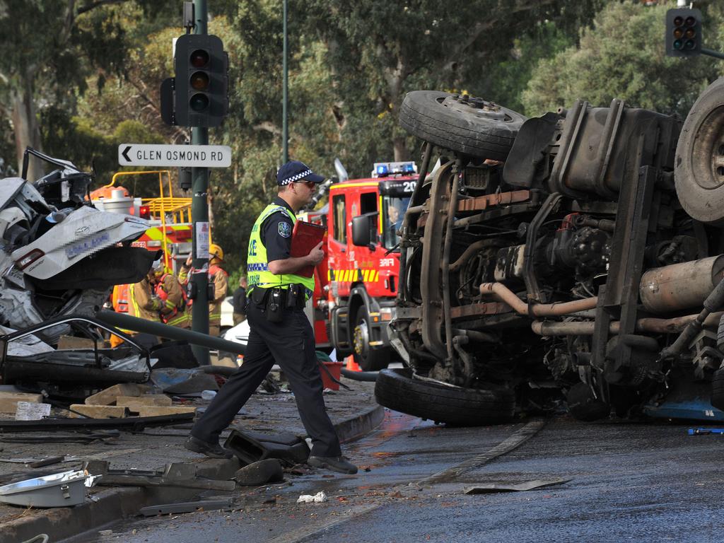 Police at the scene of a horror smash at the bottom of the freeway. Picture: Roger Wyman