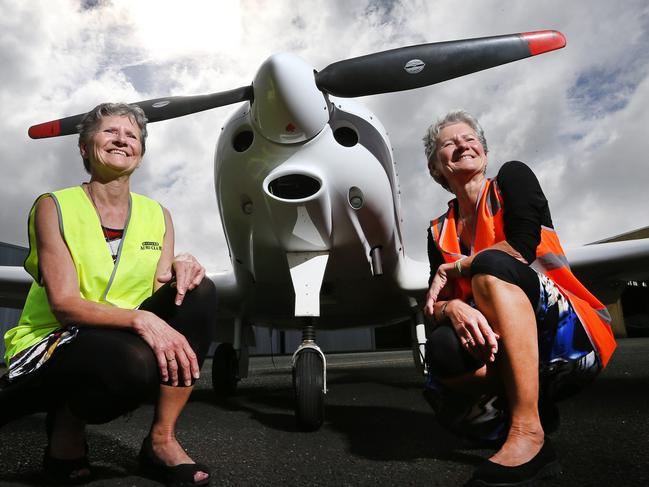 (L-R) Identical twins Lesleigh Griffin and Billie Hicks prepare for the Circum- Tasmania Challenge at Wynyard Aero Club. Picture Chris Kidd