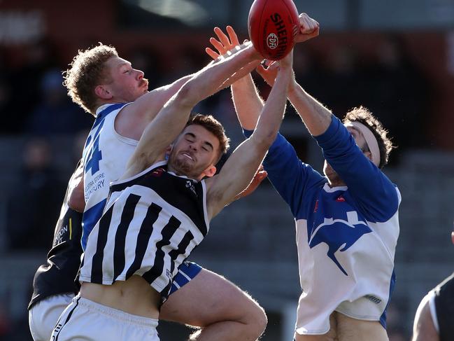 Samuel Milne flies for a mark for Moonee Valley. Picture: Mark Dadswell