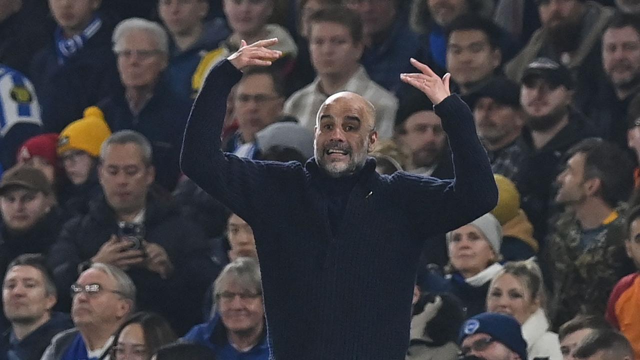 Manchester City's Spanish manager Pep Guardiola gestures on the touchline during the English Premier League football match between Brighton and Hove Albion and Manchester City at the American Express Community Stadium in Brighton, southern England on November 9, 2024. (Photo by Glyn KIRK / AFP) / RESTRICTED TO EDITORIAL USE. No use with unauthorized audio, video, data, fixture lists, club/league logos or 'live' services. Online in-match use limited to 120 images. An additional 40 images may be used in extra time. No video emulation. Social media in-match use limited to 120 images. An additional 40 images may be used in extra time. No use in betting publications, games or single club/league/player publications. /