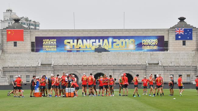 Gold Coast Sun players train at Jiangwan Stadium, renamed Adelaide Arena for Saturday’s clash, in Shanghai, China this week. Picture: AAP Image/David Mariuz