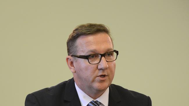 Queensland Member for Gympie, David Gibson during a condolence address for flood victims on the first sitting day of the Queensland Parliament for the year at Parliament House in Brisbane, Tuesday, Feb. 12, 2013. (AAP Image/Dave Hunt) NO ARCHIVING