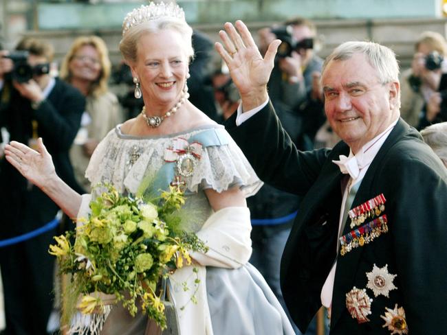 Queen Margrethe and husband Prince Henrik of Denmark arrive at The Royal Theatre in Copenhagen for Gala performance in 2004 on eve of their son, Danish Crown Prince Frederik's marriage to Australian Mary Donaldson. Picture:  Supplied