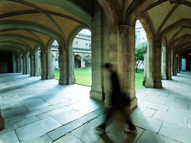 JUNE 6, 2000 : Student in Melbourne University's old Law Quadrangle 06/06/00. Pic Graham Crouch.Victoria / Education / Interior