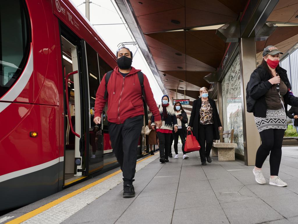 Unlike NSW, facemasks are still mandatory outdoors in the ACT. Picture: Rohan Thomson/Getty Images