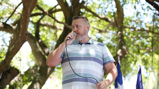 Thousands of people attend the Worldwide Rally for Freedom protest and march against the government's vaccine mandates on the Cairns Esplanade. Division 9 councillor Brett Olds spoke at the rally and was cheered on. Picture: Brendan Radke