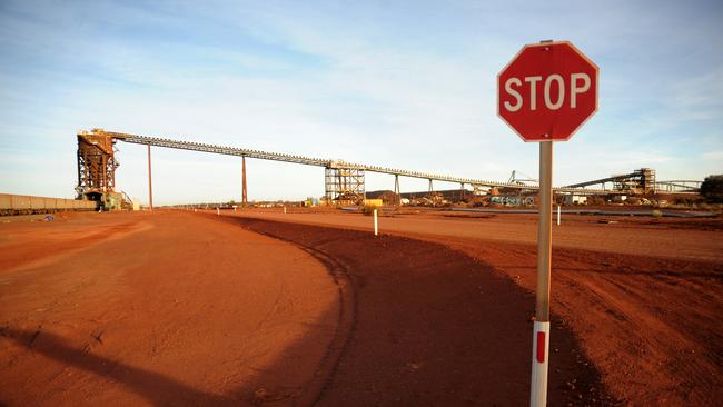 A stop sign stands at the entrance to the crushing facility at Fortescue’s Cloudbreak iron ore operation in Western Australia. Picture: Bloomberg