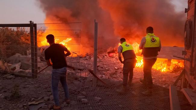 Rescuers rush to the scene of an Israeli airstrike that targeted the southern Lebanese village of Abbasiyeh on September 24. Picture: Kawnat Haju/AFP